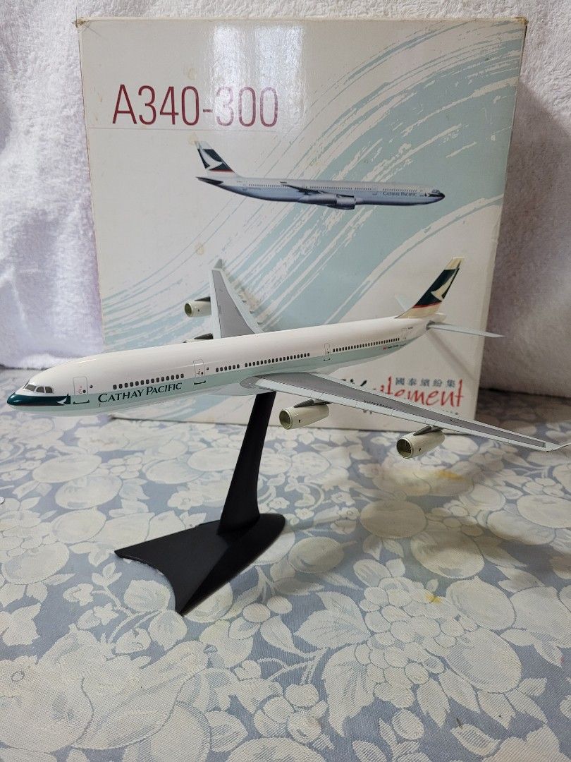 Cathay Pacifics scale 1:200 (Category: Vehicle & Diecast Models) located in Cavite. Submitted by jovimiraph (Listing ID 1364995944, Image 2). Description: A340 300 broken tires and missing some discoloration with box with stand 747 400 no stand but with wheels with box 777 300 no wheels but with stand with box.
