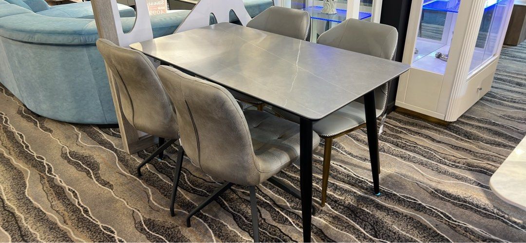 Dining Table Set (Category: Tables & Sets) located in Singapore. Submitted by claytonlim21 (Listing ID 1365012467, Image 1). Description: Sintered stone dining table come with 4 chairs Lenght 130cm Depth 70cm Choice of chairs you can choose We got over 20model chairs Dining table with 4 chairs original price $1199 Delivery free Price before 9% gst Only available @Nova Furnishing Tradehub21 Free delivery Free instalation Why buy from us? Reputable