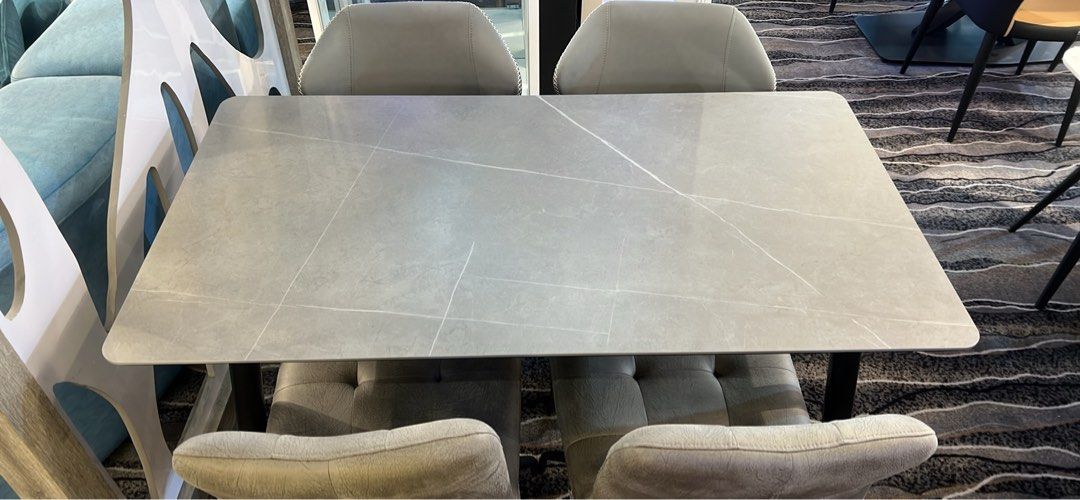 Dining Table Set (Category: Tables & Sets) located in Singapore. Submitted by claytonlim21 (Listing ID 1365012467, Image 2). Description: Sintered stone dining table come with 4 chairs Lenght 130cm Depth 70cm Choice of chairs you can choose We got over 20model chairs Dining table with 4 chairs original price $1199 Delivery free Price before 9% gst Only available @Nova Furnishing Tradehub21 Free delivery Free instalation Why buy from us? Reputable