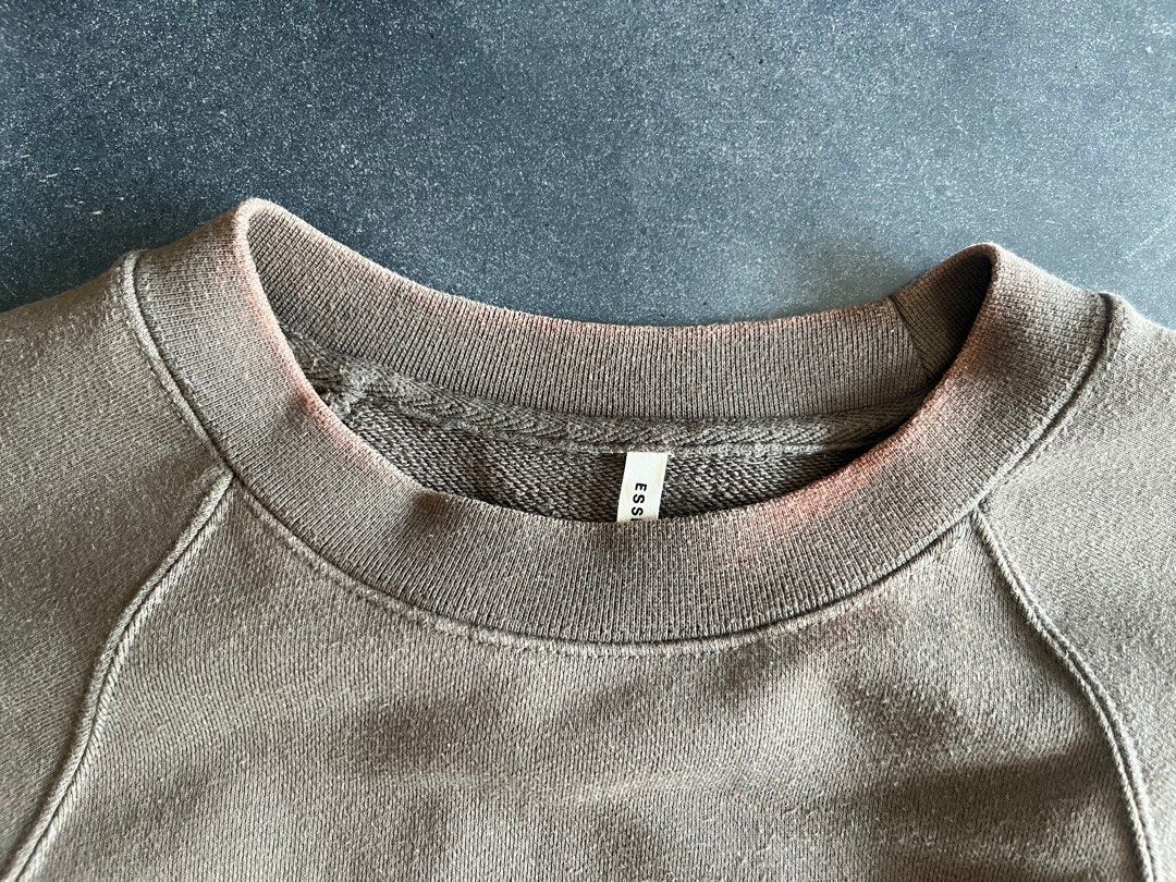 Fear of God Essentials Sweater (Category: Coats, Jackets and Outerwear) located in Manila. Submitted by cappinjay (Listing ID 1364965800, Image 2). Description: Fear of God Essentials Sweater Condition: Well Used, Decoloration on collar Color: Olive/Green Side Zippers style Size Small, Can fit XS 100% Authentic .