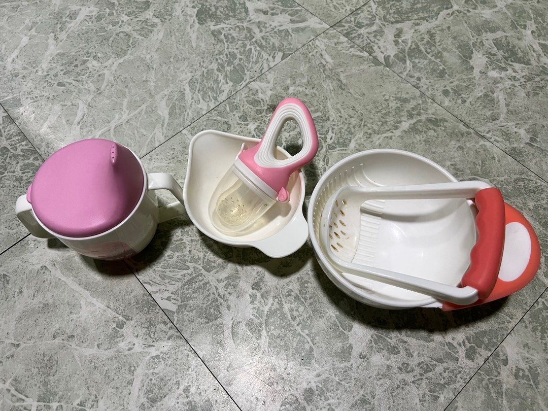 Feeding Essentials (Category: Weaning & Toddler Feeding) located in Manila. Submitted by mrac10 (Listing ID 1364949694, Image 1). Description: Take all na. Includes: fruit pacifier and smasher, bowl and training cup. .