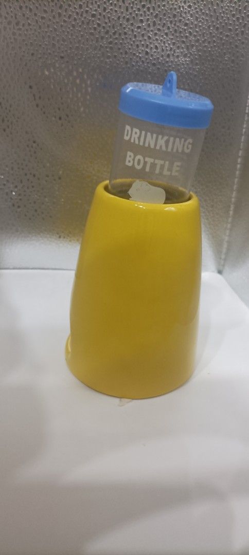 Hamster water bottles (Category: Homes & Other Pet Accessories) located in Singapore. Submitted by clearancesaleess (Listing ID 1365098360, Image 3). Description: white and blue don't actually remember using like new white - $2 each blue- $3 each yellow ceramic water bottle stand with hiding place and blue small water bottle- lightly used $4.
