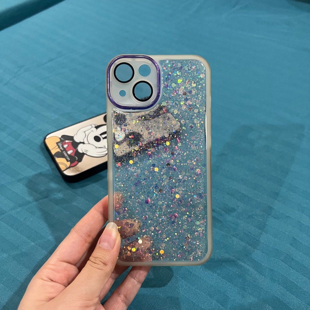 Iphone 13 Cases - Casetify Disney Mickey Mouse, Transparent Glitter (Category: Cases & Sleeves) located in Pasig City. Submitted by beabimbop (Listing ID 1365046210, Image 3). Description: 🌷 Take both for Php 200 only! 🌷 If buy indiv.: • Casetify Disney Mickey Mouse case (mirror) - Php 150 • [SOLD ❌] Glitter case (transparent) 🌷 In good condition RFS: Decluttering.