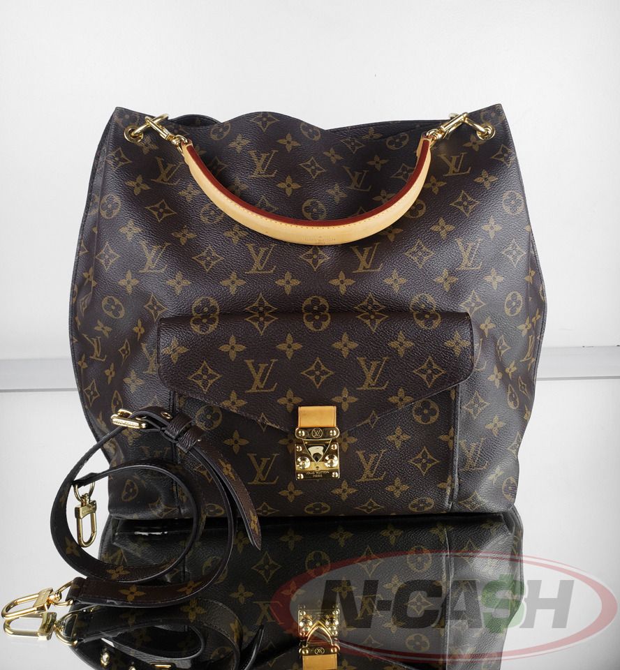 Louis Vuitton Monogram Canvas Metis Hobo Bag (Category: Luxury Bags & Wallets) located in Makati City. Submitted by luxury_by_ncash_2 (Listing ID 1364983189, Image 1). Description: N-Cash Pawnshop "Instant Cash for Bags, Watches, Cars, and Electronics" https://www.ncash-pawnshop-philippines.com/ Louis Vuitton Monogram Canvas Metis Hobo Bag Brand: LOUIS VUITTON Measures: 12″ L x 14″ H x 4.75″ D (approx) 4.25” Vachetta Handle Material: Monogram coa