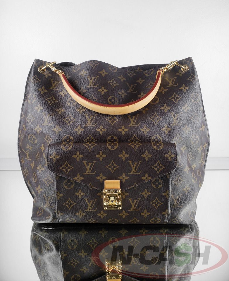 Louis Vuitton Monogram Canvas Metis Hobo Bag (Category: Luxury Bags & Wallets) located in Makati City. Submitted by luxury_by_ncash_2 (Listing ID 1364983189, Image 2). Description: N-Cash Pawnshop "Instant Cash for Bags, Watches, Cars, and Electronics" https://www.ncash-pawnshop-philippines.com/ Louis Vuitton Monogram Canvas Metis Hobo Bag Brand: LOUIS VUITTON Measures: 12″ L x 14″ H x 4.75″ D (approx) 4.25” Vachetta Handle Material: Monogram coa
