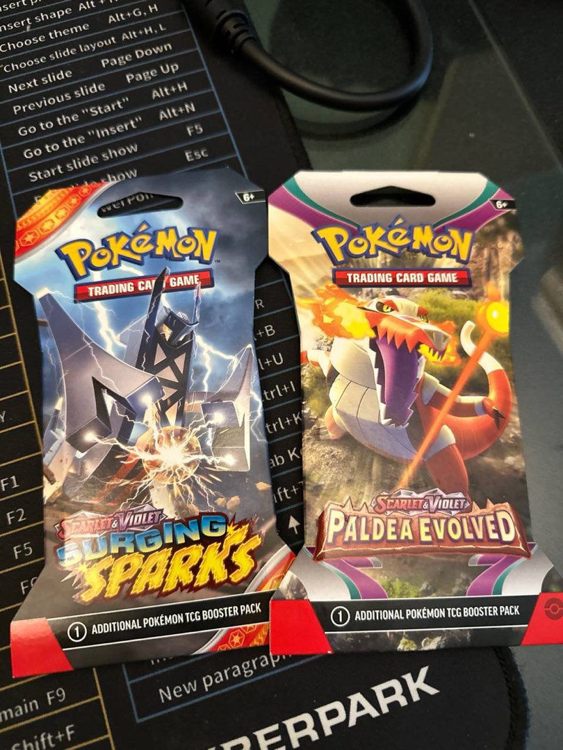Pokemon SV08 Surging Sparks Sleeved Booster X 12 main image 0