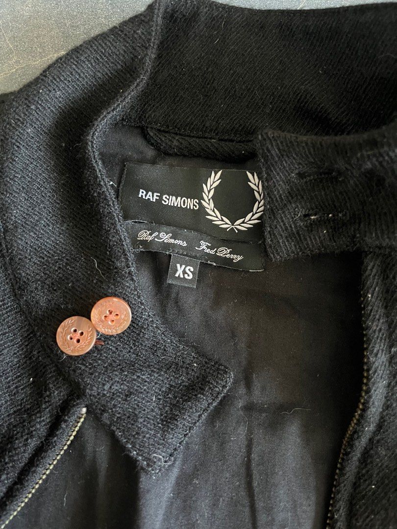 RAF SIMONS x Fred Perry Wool Jacket (Category: Coats, Jackets and Outerwear) located in Manila. Submitted by cappinjay (Listing ID 1364964085, Image 2). Description: RAF SIMONS x Fred Perry Wool Jacket Rare Collaboration piece Condition: Used Color: Brown Size XS Sizing same as Uniqlo for reference 100% Authentic.
