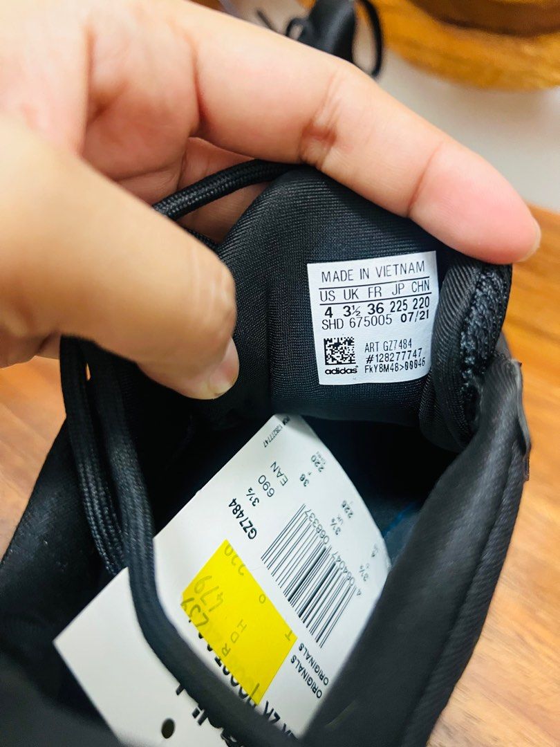 ZX 2K Boost 2.0 J 'Black Gold Metallic' (Category: Sneakers) located in Makati City. Submitted by cathgarc (Listing ID 1365058561, Image 3). Description: Please see below for actual size. Size US 4 UK 3 1/2 FR 36 JP 225 CHN 220 SKU GZ7484 Black Gold metallic color Rfs: wrong size No exchange and no returns. .