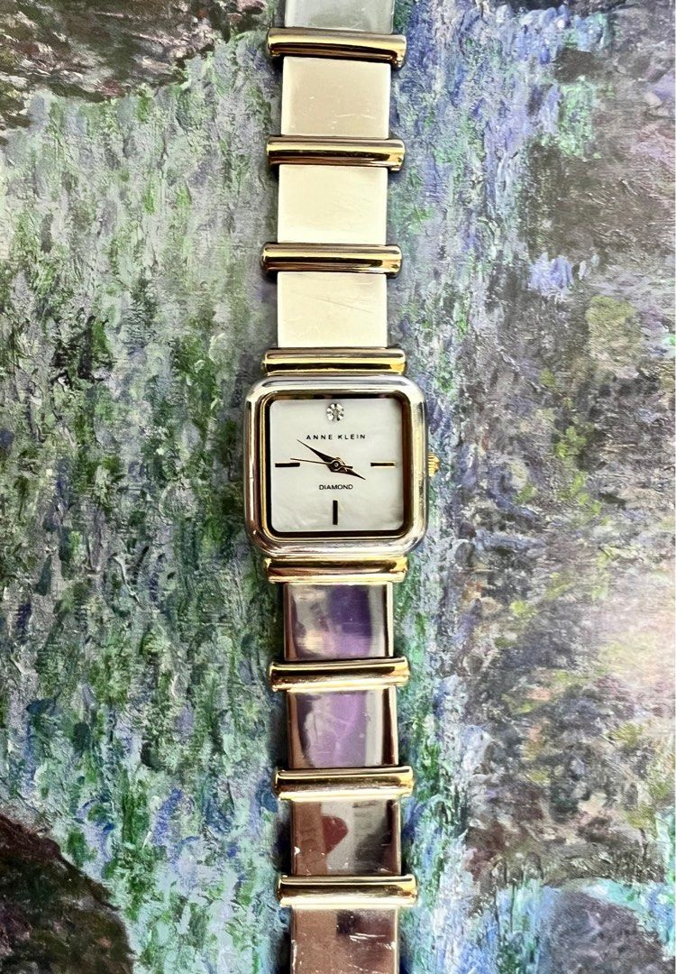 Anne klein two tone square diamond watch (Category: Women's Watches) located in Singapore. Submitted by watchoutditto (Listing ID 1365292510, Image 2). Description: Anne Klein Two Tone Square diamond Watch Condition: Fully functional with brand new batteries! This Anne Klein two-tone square diamond watch boasts a stylish yet timeless design—ideal for elevating any look with a chic, sleek, and classic touch. A perfect blend of elegance and practic