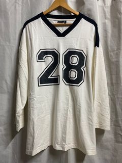ASOS DESIGN long sleeve football tee with number 28 graphic and v neck in ivory