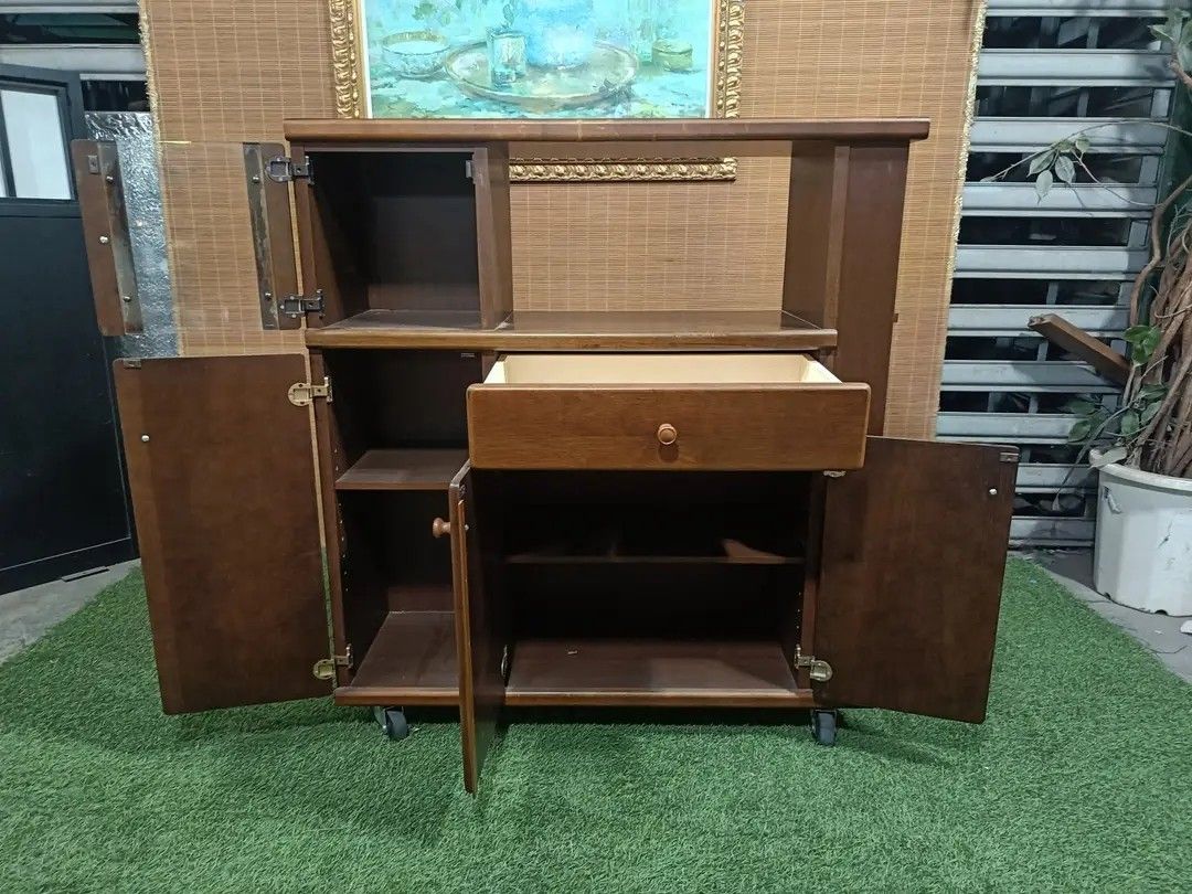 Bar Island Table Cabinet Solid Wood, Mobile with Side Rack 36L x 13W x 39H inches In VERY good condition (Category: Shelves, Cabinets & Racks) located in Manila. Submitted by eloizavill76462 (Listing ID 1365237515, Image 2). Description: Bar Island Table Cabinet Solid Wood, Mobile with Side Rack 36L x 13W x 39H inches In VERY good condition.