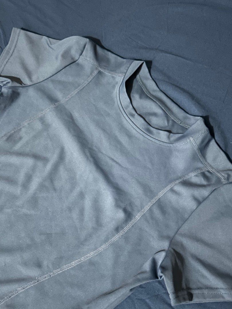 Blue compression top (Category: Activewear) located in Makati City. Submitted by declutterwjn_ (Listing ID 1365296430, Image 2). Description: Used just once. Lost some weight so loose on me now. Best fits large to XL frames for fitted fit. .