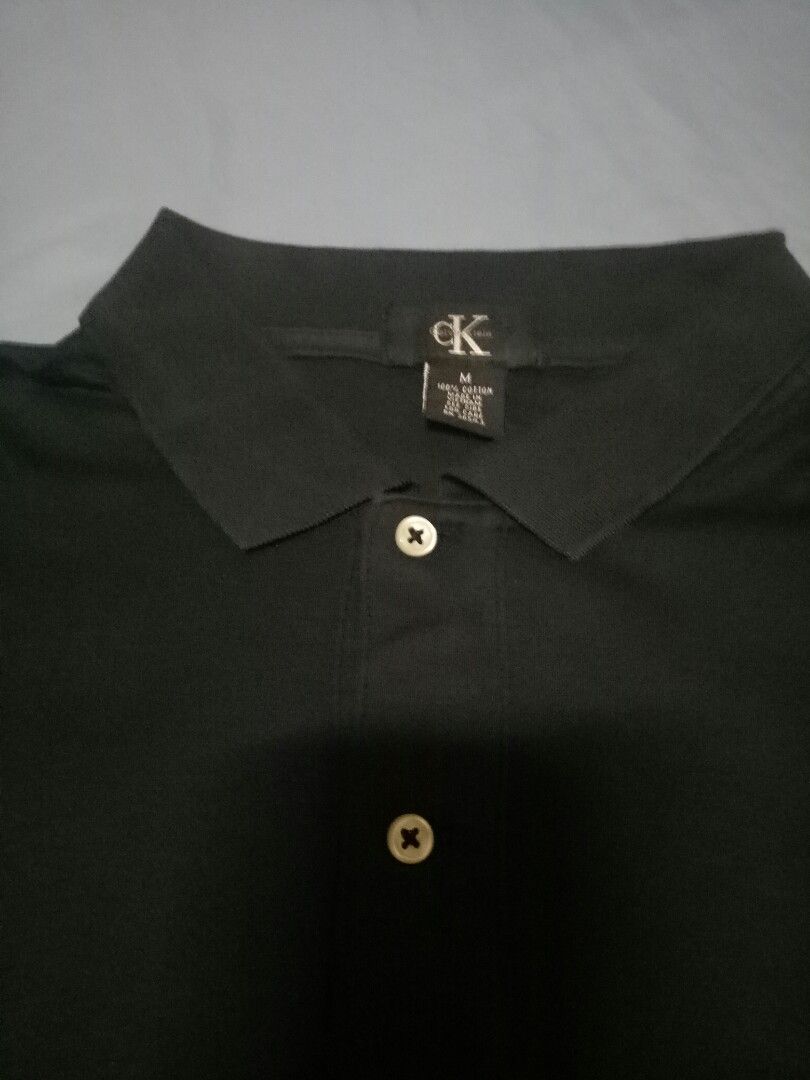 calvin klein black shirt (Category: Tshirts & Polo Shirts ) located in Manila. Submitted by freespace01 (Listing ID 1365209441, Image 2). Description: calvin klein black polo shirt color rate 7/10 shoulder - 18 inches length - 28 inches.