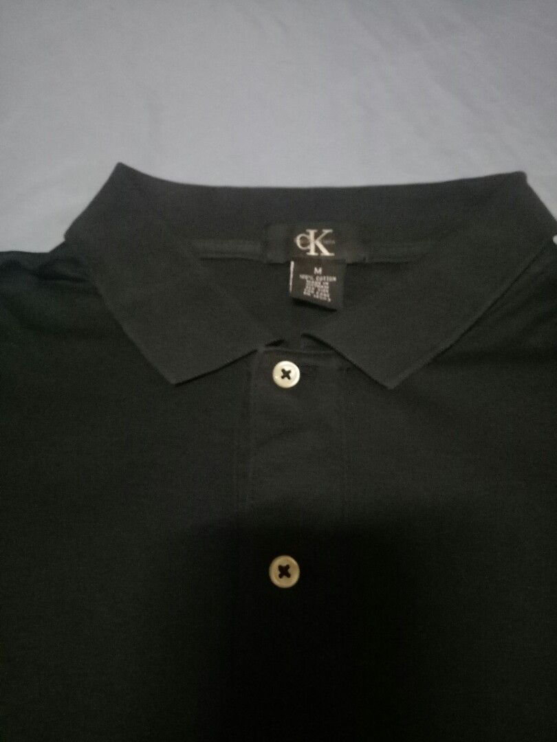 calvin klein black shirt (Category: Tshirts & Polo Shirts ) located in Manila. Submitted by freespace01 (Listing ID 1365209441, Image 3). Description: calvin klein black polo shirt color rate 7/10 shoulder - 18 inches length - 28 inches.