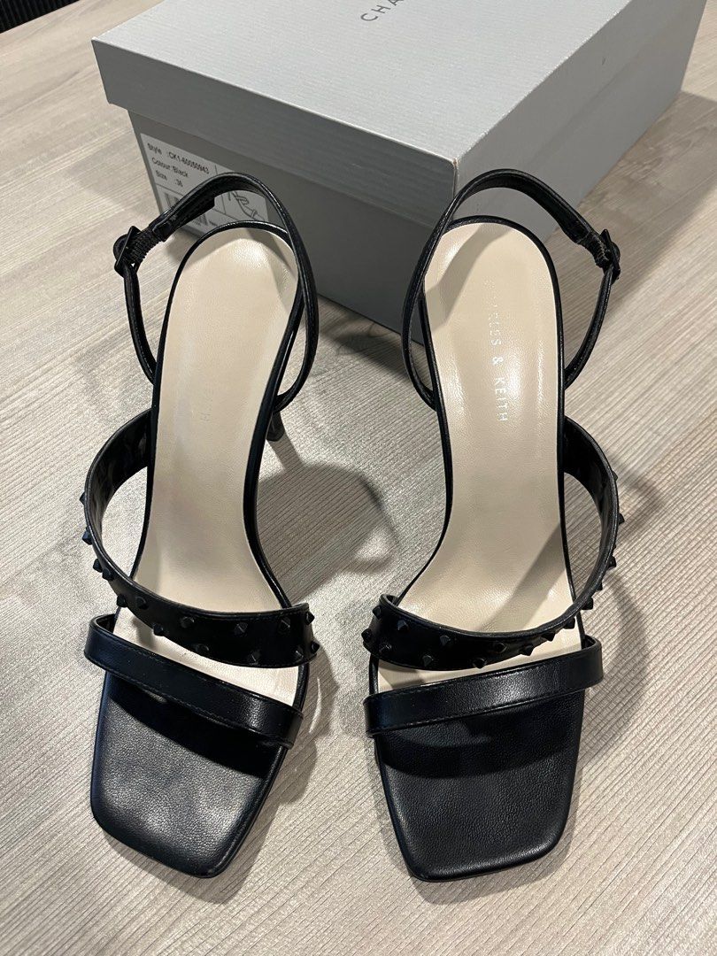 Charles & keith asymmetric studded sandals (Category: Heels) located in Las Pinas. Submitted by masterjac (Listing ID 1365231649, Image 3). Description: Decluttering. Used twice at most. MOP: Metrobank / gcash Buyer to book own courier. Location is near Festival mall Alabang. Monday-Thursdays 7:00 AM to 3:00 PM. Thank you .