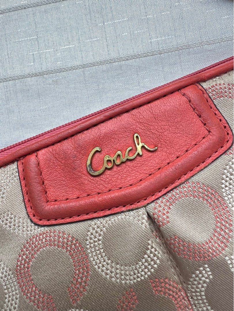 Coach Signature Red/Brown Pochette/Wristlet (Category: Luxury Bags & Wallets) located in Floridablanca. Submitted by lj_domasian (Listing ID 1365150621, Image 3). Description: Original! Coach Signature Red/Brown Pochette/Wristlet ₱3,300 𝗜𝗻𝗰𝗹𝘂𝘀𝗶𝗼𝗻/𝘀: c0.ach charm 𝑪𝒐𝒏𝒅𝒊𝒕𝒊𝒐𝒏: 8.5/10 - good condition ~ 𝐂𝐨𝐧𝐝𝐢𝐭𝐢𝐨𝐧 𝐝𝐞𝐬𝐜𝐫𝐢𝐩𝐭𝐢𝐨𝐧👇🏼 - no flaws. Minor signs of use only. 𝗗𝗶𝗺𝗲𝗻𝘀𝗶𝗼𝗻𝘀: 👇🏼 Length - 9.5” Height 