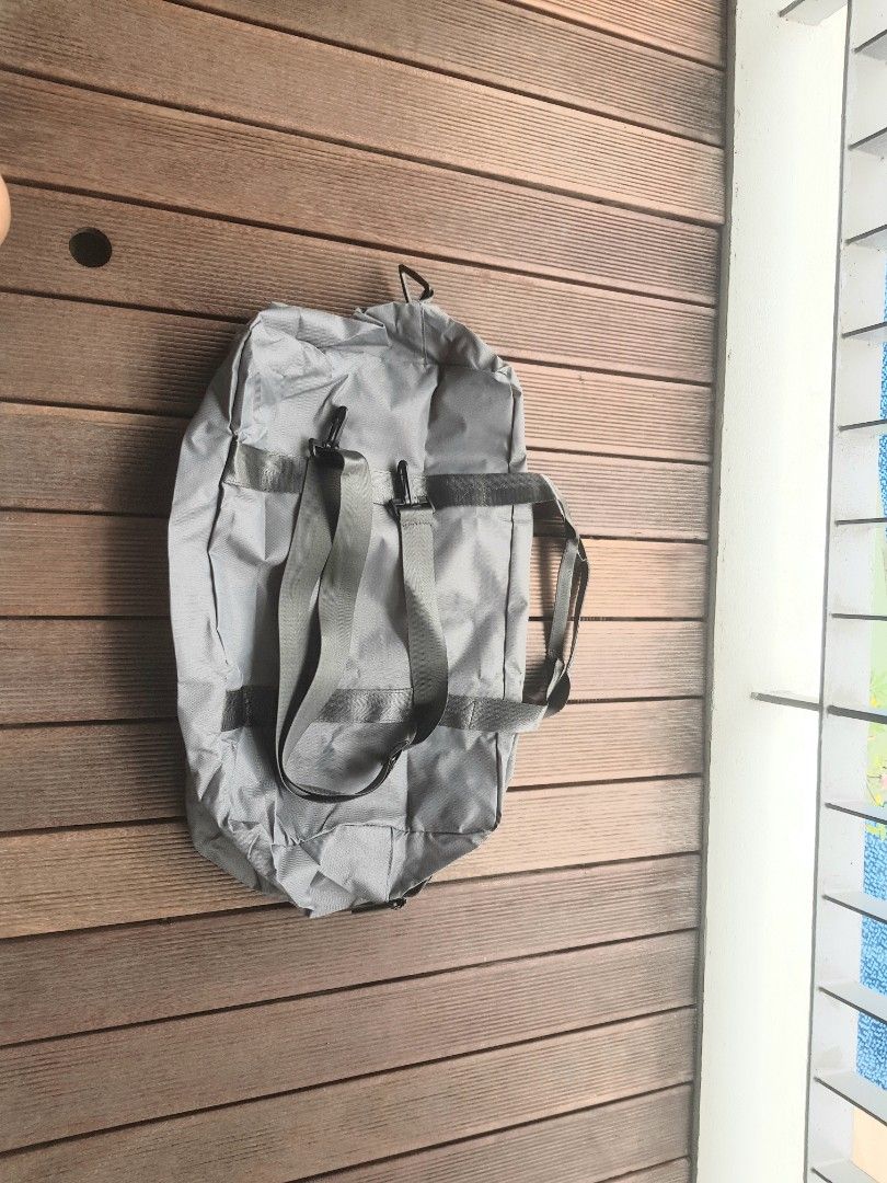 Duffle Bag. Foldable for travelers (Category: Bags & Wallets) located in Singapore. Submitted by hrcomeon57239 (Listing ID 1365179702, Image 3). Description: Foldable duffle bag Very big capacity Good for travelling Water resistance material Very strong.