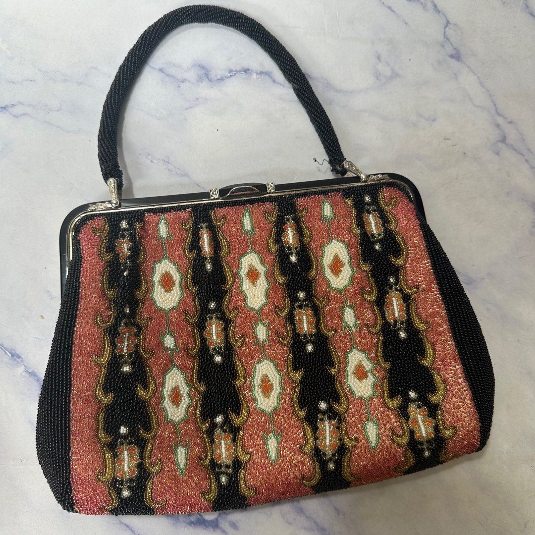 Fully beaded intricate design elegant clutch bag (Category: Clutches) located in Quezon City. Submitted by StopNShop (Listing ID 1365183249, Image 1). Description: •japan sourced •fully beaded bag including handle •there’s some missing beads in the handle but otherwise really beautiful •super nice in actual •very spacious .
