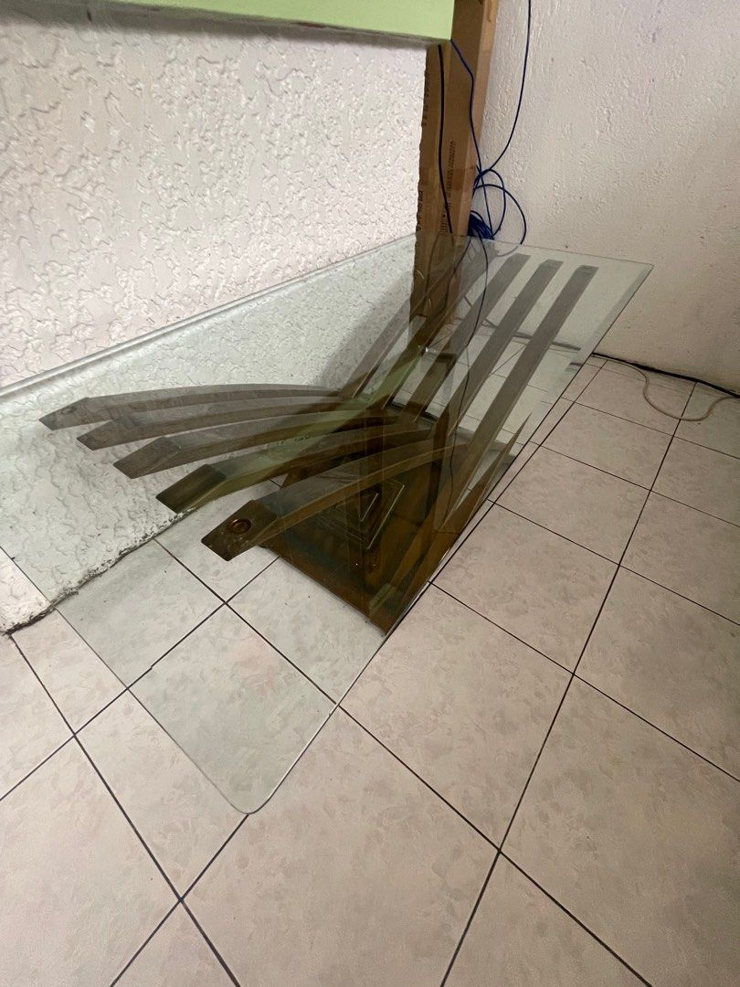 Glass table brass furnished (Category: Tables & Sets) located in Caloocan City. Submitted by kebinbrown88217 (Listing ID 1365164585, Image 3). Description: Glass Center Table made of brass for sale for only 5000php. Dimensions: 118cm length 78cm width 70cm height For pickup only dito sa kaligayahan, qc Message me or text me 09282287867.
