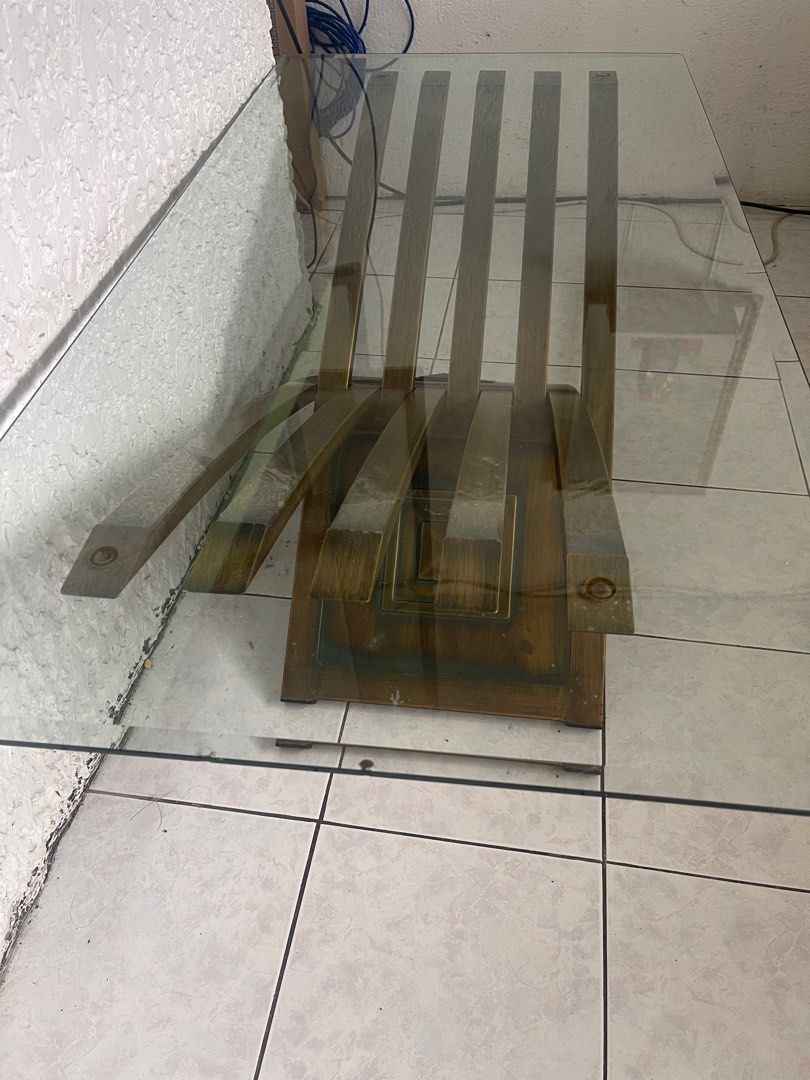 Glass table brass furnished (Category: Tables & Sets) located in Caloocan City. Submitted by kebinbrown88217 (Listing ID 1365164585, Image 2). Description: Glass Center Table made of brass for sale for only 5000php. Dimensions: 118cm length 78cm width 70cm height For pickup only dito sa kaligayahan, qc Message me or text me 09282287867.