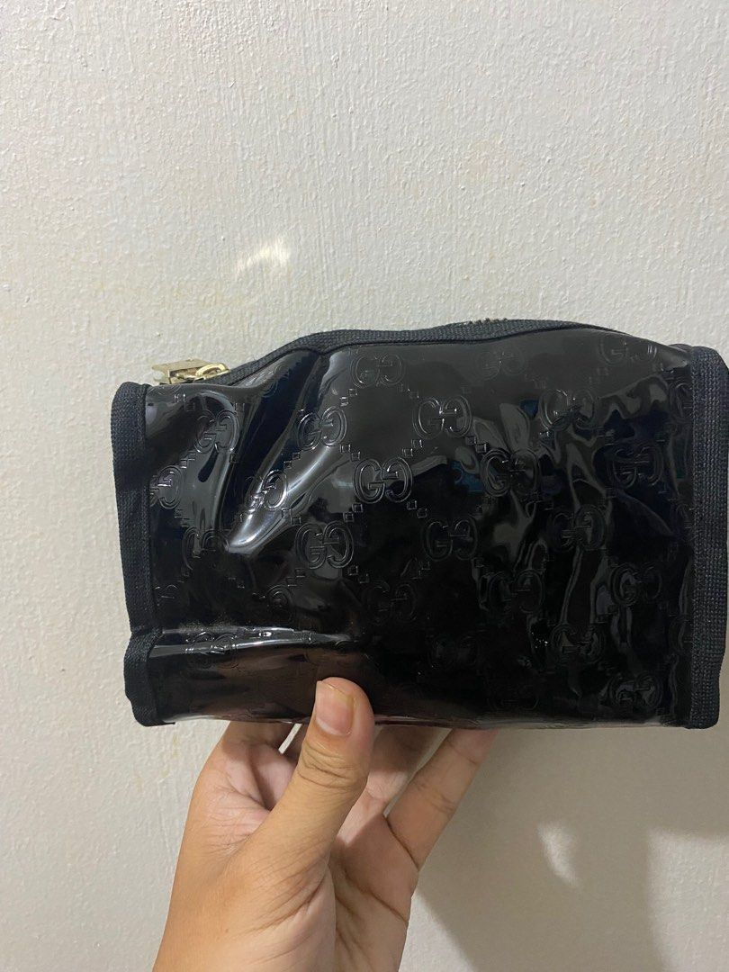 Gucci pouch (Category: Luxury Bags & Wallets) located in Davao. Submitted by kentjustin78161 (Listing ID 1365146986, Image 2). Description: No issue Excellent condition Authentic .