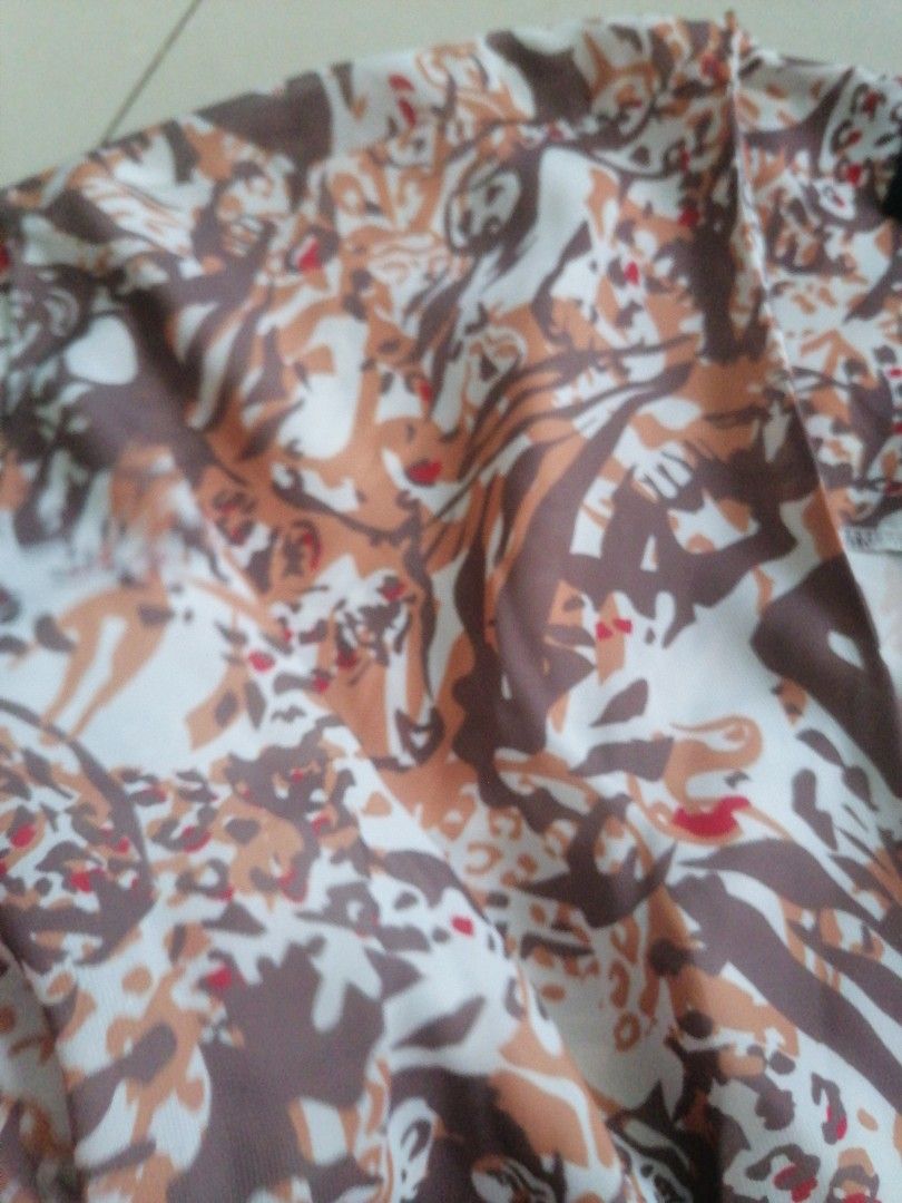 Plains and prints wrap around top (Category: Blouses) located in Cabanatuan. Submitted by misshell26 (Listing ID 1365125495, Image 2). Description: Like new.