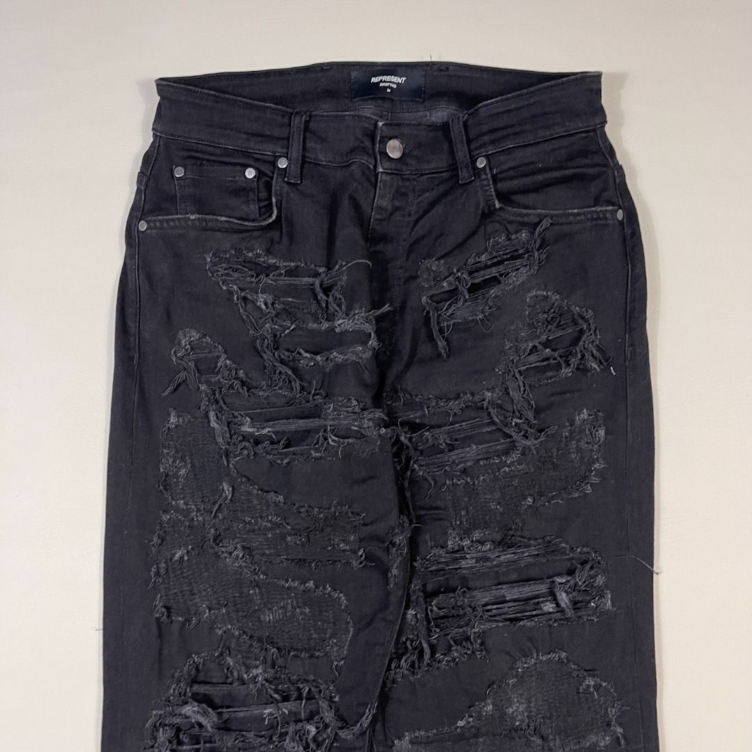 Represent - Baggy Shredded Denim Pants (Category: Jeans) located in Manila. Submitted by topshelf_v2 (Listing ID 1365284641, Image 2). Description: Item Description These jeans give off a gritty, edgy, and high-fashion streetwear vibe — perfect for styling with boots or sneakers, oversized graphic tees, and leather or denim jackets. Size: 34 Dimensions Waist: 34 Front rise: 13" Thigh: 11.5" Inseam: 29.5" Leg opening: 6.5" Out seam: 41" Condition: