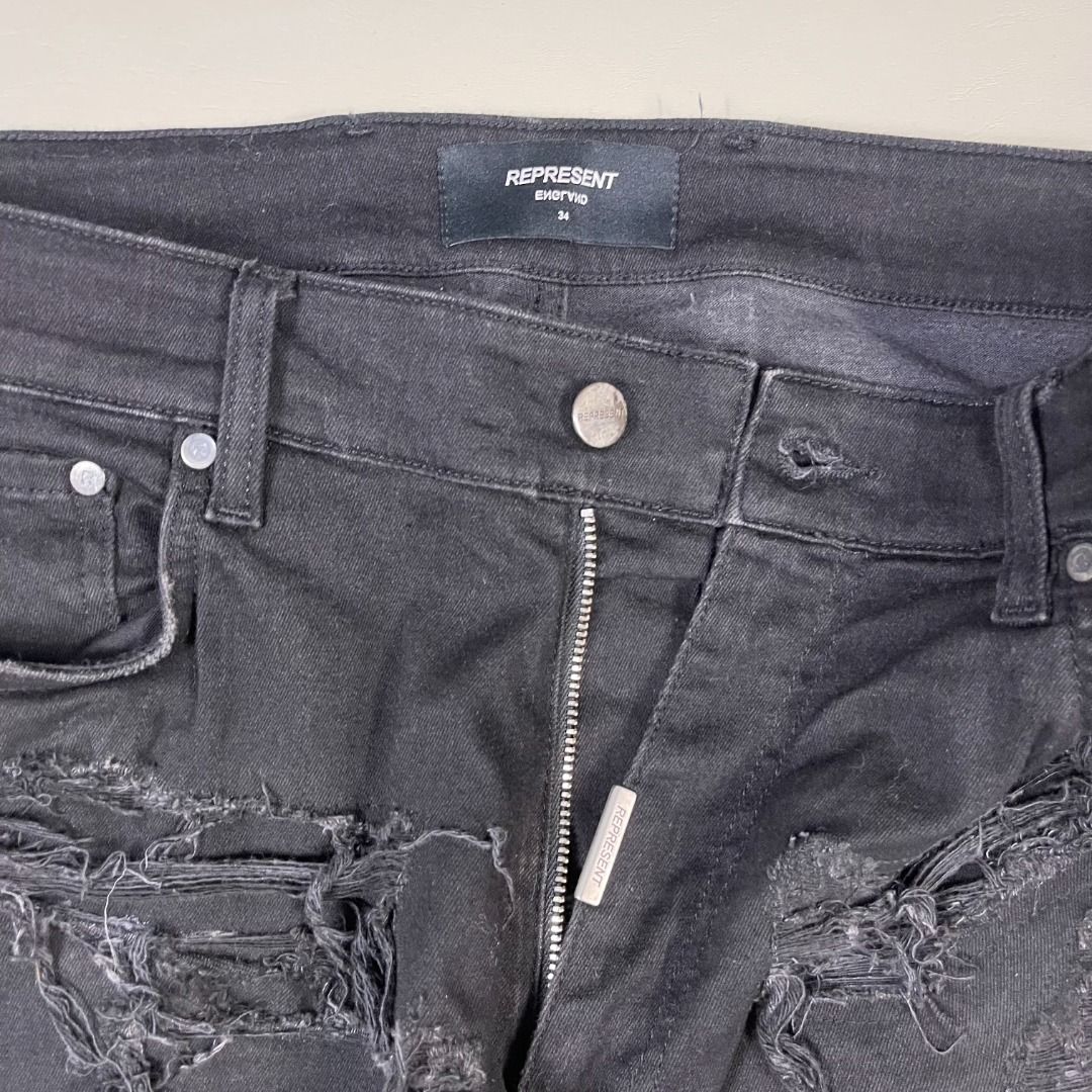 Represent - Baggy Shredded Denim Pants (Category: Jeans) located in Manila. Submitted by topshelf_v2 (Listing ID 1365284641, Image 3). Description: Item Description These jeans give off a gritty, edgy, and high-fashion streetwear vibe — perfect for styling with boots or sneakers, oversized graphic tees, and leather or denim jackets. Size: 34 Dimensions Waist: 34 Front rise: 13" Thigh: 11.5" Inseam: 29.5" Leg opening: 6.5" Out seam: 41" Condition: