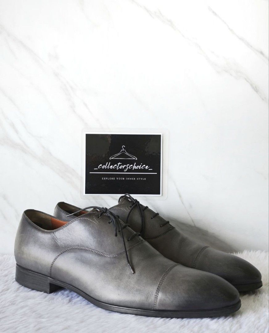 Santoni Charcoal Men's Laced Shoes (Category: Dress Shoes) located in Makati City. Submitted by _collectorschoice_ (Listing ID 1365290653, Image 1). Description: ° Elegant and distinctive, this Oxford lace-up is an emblem of Santoni’s artisanal expertise, bringing refined sophistication to formal looks and extra-special occasions. ° Its fine leather construction is treated with the charming allure of our iconic “velatura” gradated finish. A Goody