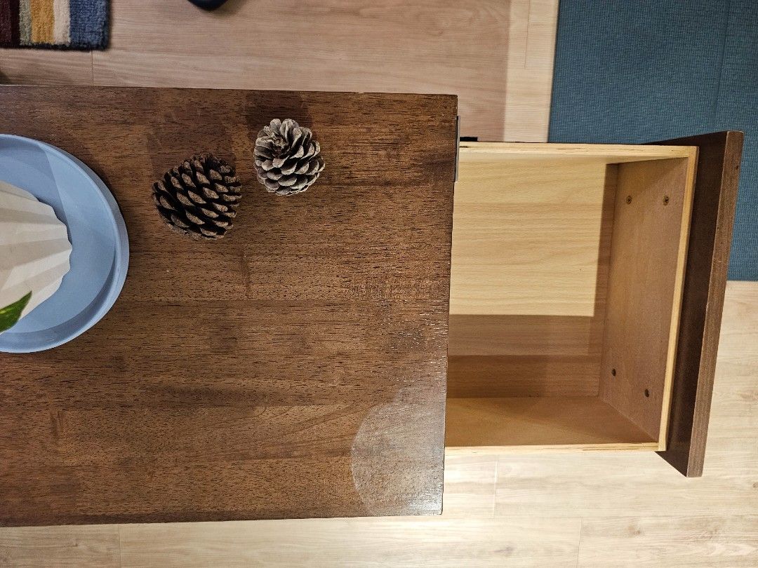 Solid wood Bedside Table (Category: Shelves, Cabinets & Racks) located in Singapore. Submitted by movingabout (Listing ID 1365282875, Image 2). Description: L350 x W500 x H560 mm Some markings on top, but still looks, stylish. Solid Wood, with walnut finish. Picket and rail, local brand, new for $169.
