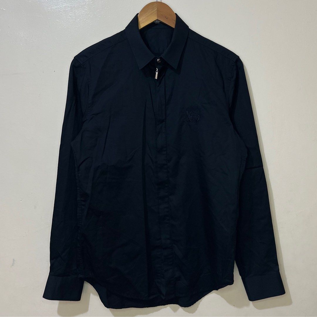Versus - Gianni Versace Long Sleeve (Category: Luxury Apparel) located in Los Banos. Submitted by _limitedsupply (Listing ID 1365301393, Image 1). Description: Versus - Gianni Versace Button & Zip Up Long Sleeve Size: 48 Laid Flat Measurements: Front Length: 27.5 inches Back Length: 28.5 inches Width: 19.3 inches Sleeve Length: 24 inches Shoulder: 17 inches Condition: Very Good ₱2,550 + sf.