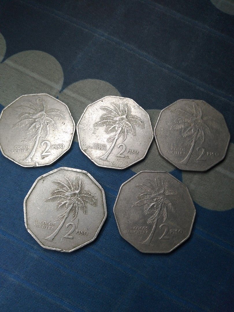 2 Piso coconut tree (Category: Currency) located in Quezon City. Submitted by nette69 (Listing ID 1365389718, Image 2). Description: 1983,84,85, 1989,1990 5 pcs for 300 pesos.