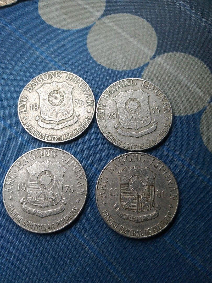 ABL 1 Piso 1976, 1977, 1979,1981 (Category: Currency) located in Quezon City. Submitted by nette69 (Listing ID 1365391162, Image 2). Description: all 4 coins 200 pesos.