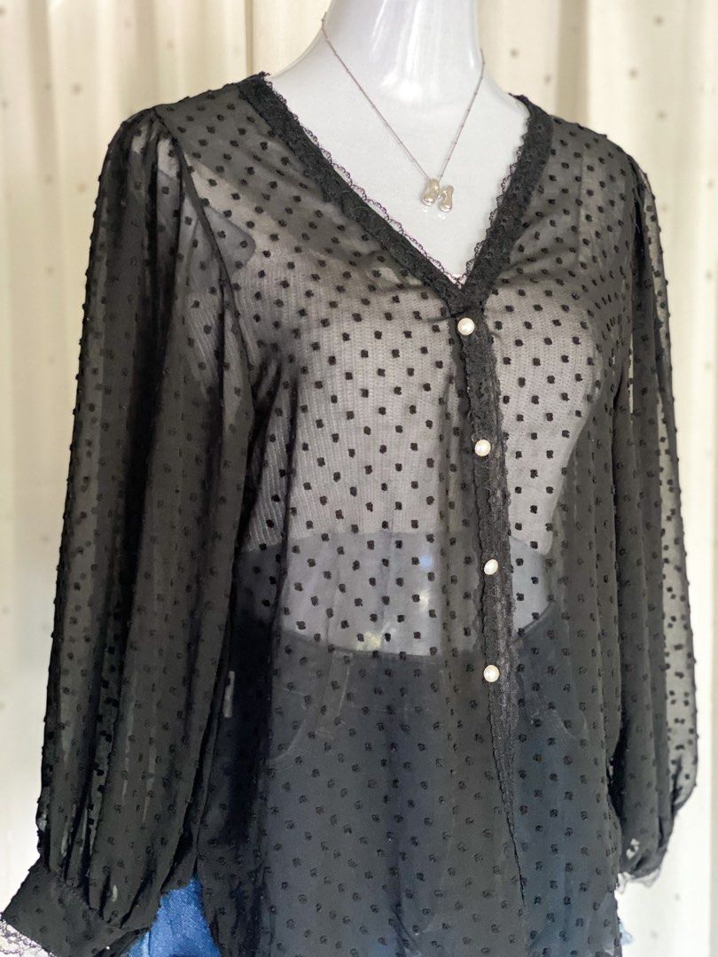 Black Polka Dots See-through Blouse (Category: Blouses) located in Taytay. Submitted by anmafego (Listing ID 1365474568, Image 2). Description: - casual or office attire ✔️ - no issues but color may change due to lighting 🤳🏻 - pls check out my preloved items, you might find something to add 🫶🏻.