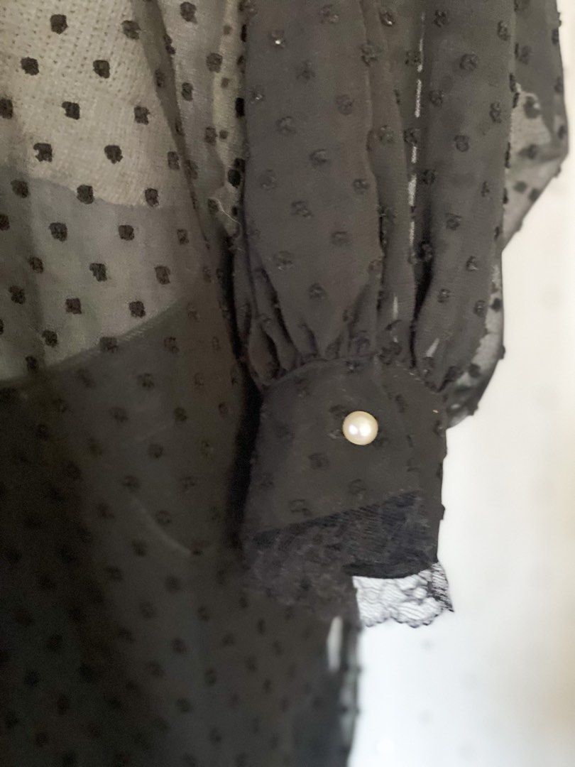 Black Polka Dots See-through Blouse (Category: Blouses) located in Taytay. Submitted by anmafego (Listing ID 1365474568, Image 3). Description: - casual or office attire ✔️ - no issues but color may change due to lighting 🤳🏻 - pls check out my preloved items, you might find something to add 🫶🏻.
