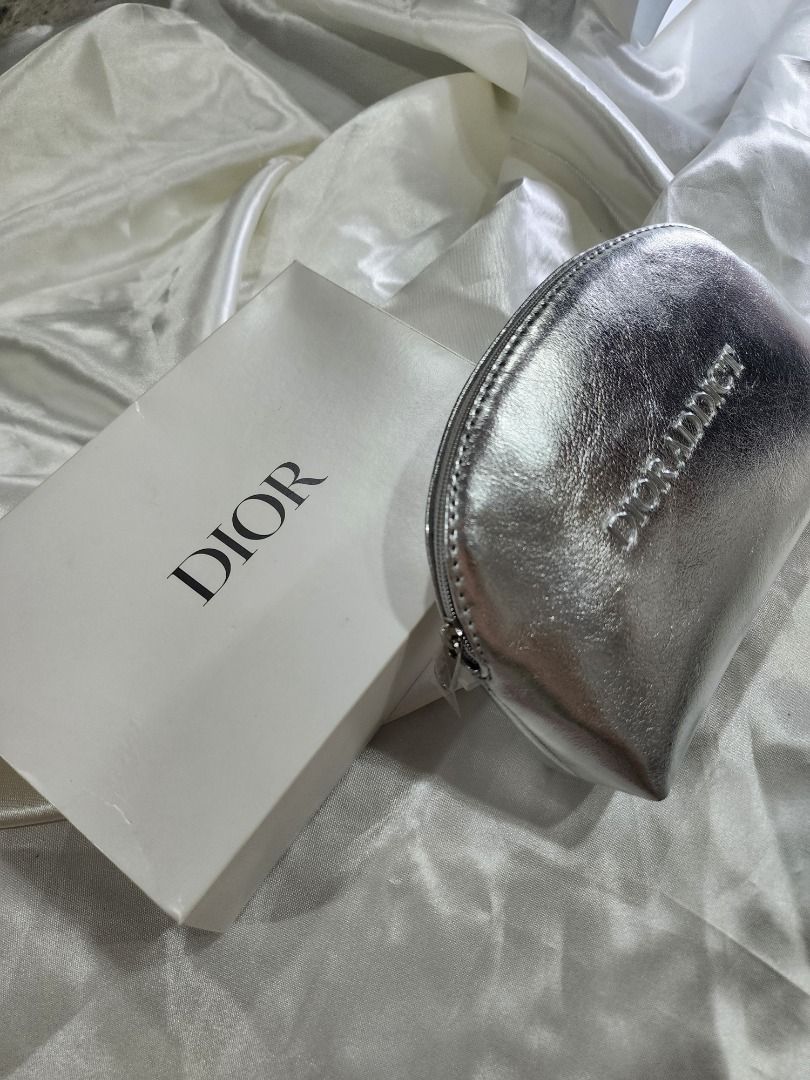 Christian Dior Pouch Moon Silver (Category: Purses & Pouches) located in Tanay. Submitted by eulaaaaa (Listing ID 1365473224, Image 1). Description: 💖 Dior Beauty Pouch – VIP Exclusive Gift 💖 Get your hands on this elegant & authentic Dior Pouch – a VIP Gift from Dior Beauty, not available for retail! ✨ Comes with Dior paper bag & box – perfect for gifting or collecting ✨ 100% Money-Back Guarantee if proven fake – shop with confidence 📦 Ships 
