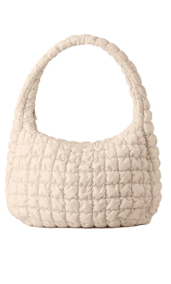 Cos Oversized Quilted Crossbody Bag (Beige) (Category: Luxury Bags & Wallets) located in Pasig City. Submitted by ccycloset (Listing ID 1365319489, Image 1). Description: Cos Oversized Quilted Crossbody Bag (Beige).