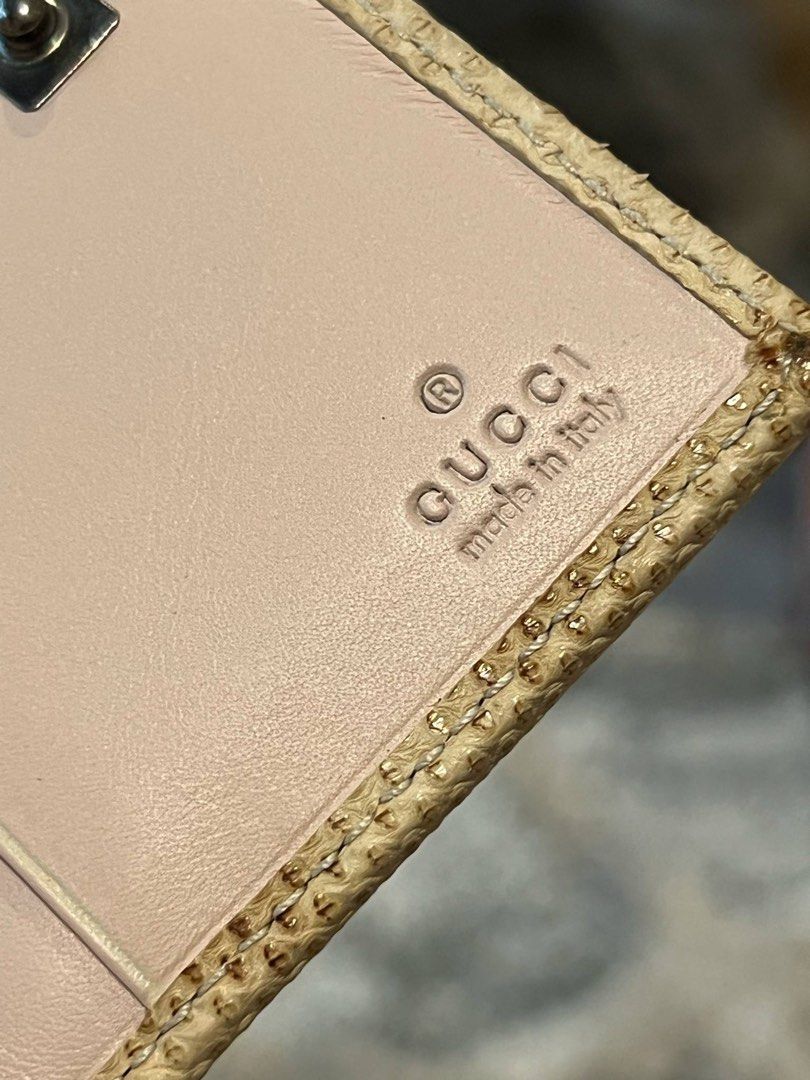 FOR SALE ORIGINAL GUCCI COMPACT WALLET (Category: Luxury Bags & Wallets) located in Caloocan City. Submitted by dandannnn2525 (Listing ID 1365418250, Image 3). Description: Gucci Compact Wallet/Card Holder/Coin Purse Color:Beige/Cream Material: Exotic Leather Condition: Like New Inclusion : Box and Pa ribbon ng box.