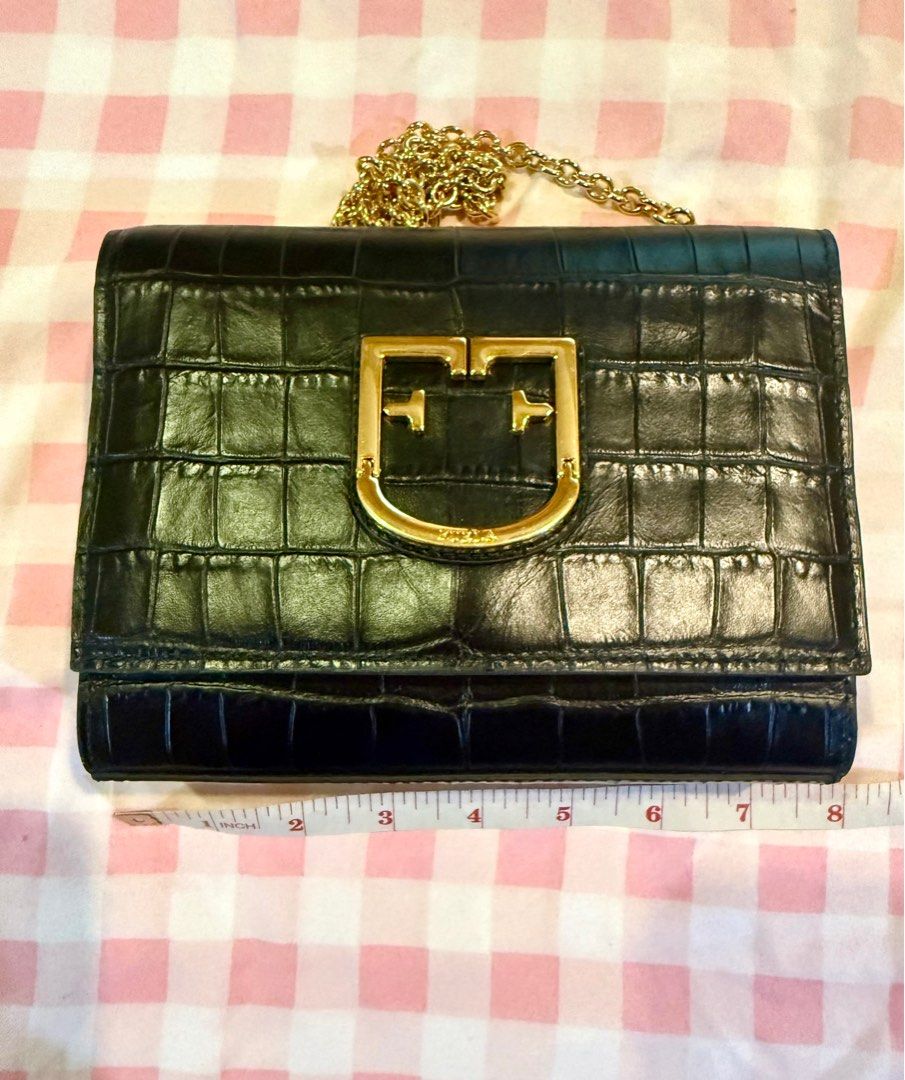 Furla sig viva mini pochette (Category: Cross-body Bags) located in Pasig City. Submitted by blushbyte (Listing ID 1365332852, Image 1). Description: Furla mock alligator 3 way formal with chain. Can be used as SHOULDER, CROSS BODY or CLUTCH. Used only 2x. With dust bag and cards. Very nice in actual. .