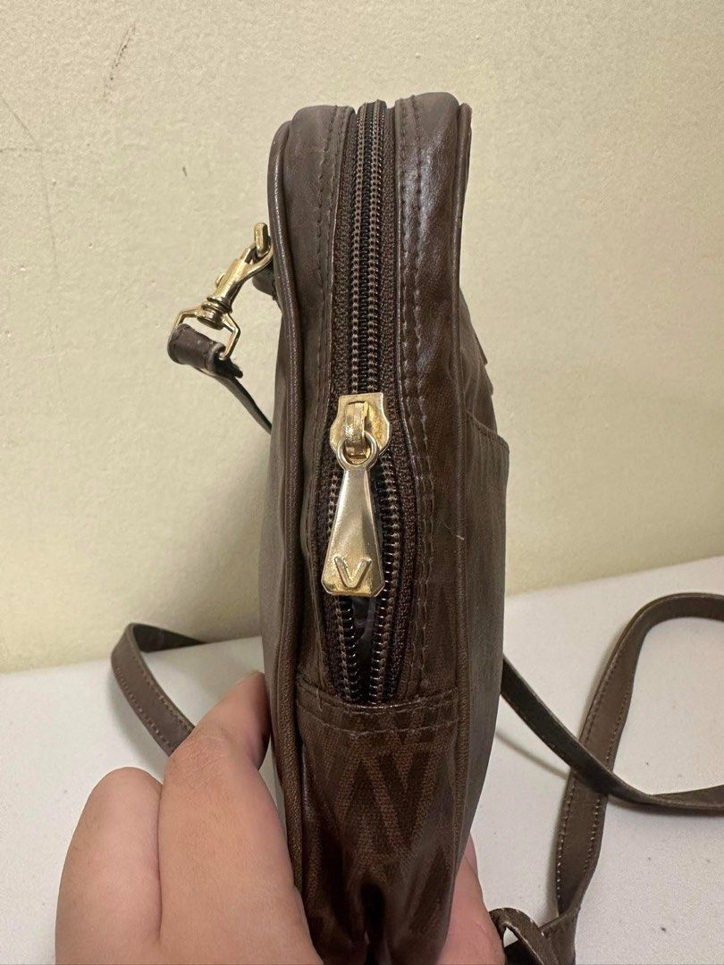 Guaranteed original 💯💯💯 Valentino slingbag (Category: Luxury Bags & Wallets) located in Quezon City. Submitted by jhaediah (Listing ID 1365407641, Image 2). Description: Guaranteed original 💯💯💯 Valentino slingbag No major flaws **please check photos for your reference ❗️PLEASE MANAGE YOUR EXPECTATIONS AS YOU WERE BUYING PRELOVED BAGS. ❌❌ no return & no exchange.