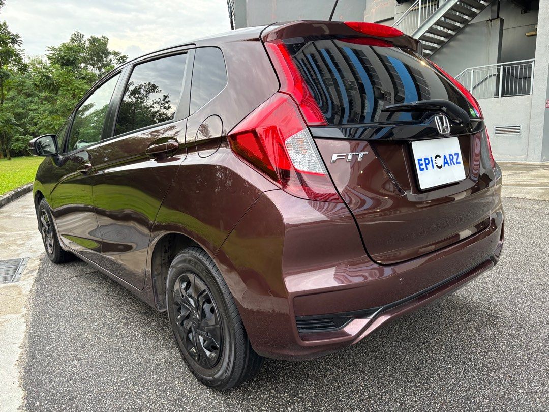 Honda Fit 1.3A GF Auto (Category: Used Cars) located in Singapore. Submitted by epicztrading (Listing ID 1365316179, Image 2). Description: Rare Original Brown Colour. 1 Owner only with Low Genuine Mileage! Free 3 years Engine Warranty with 3 years servicing. Well maintained and looked after unit! Contact us for a no-obligations consultation & viewing! Trade in welcome! We take in cars for Scrap/Export too! Reliable and fuel efficient 1.3L Earth 