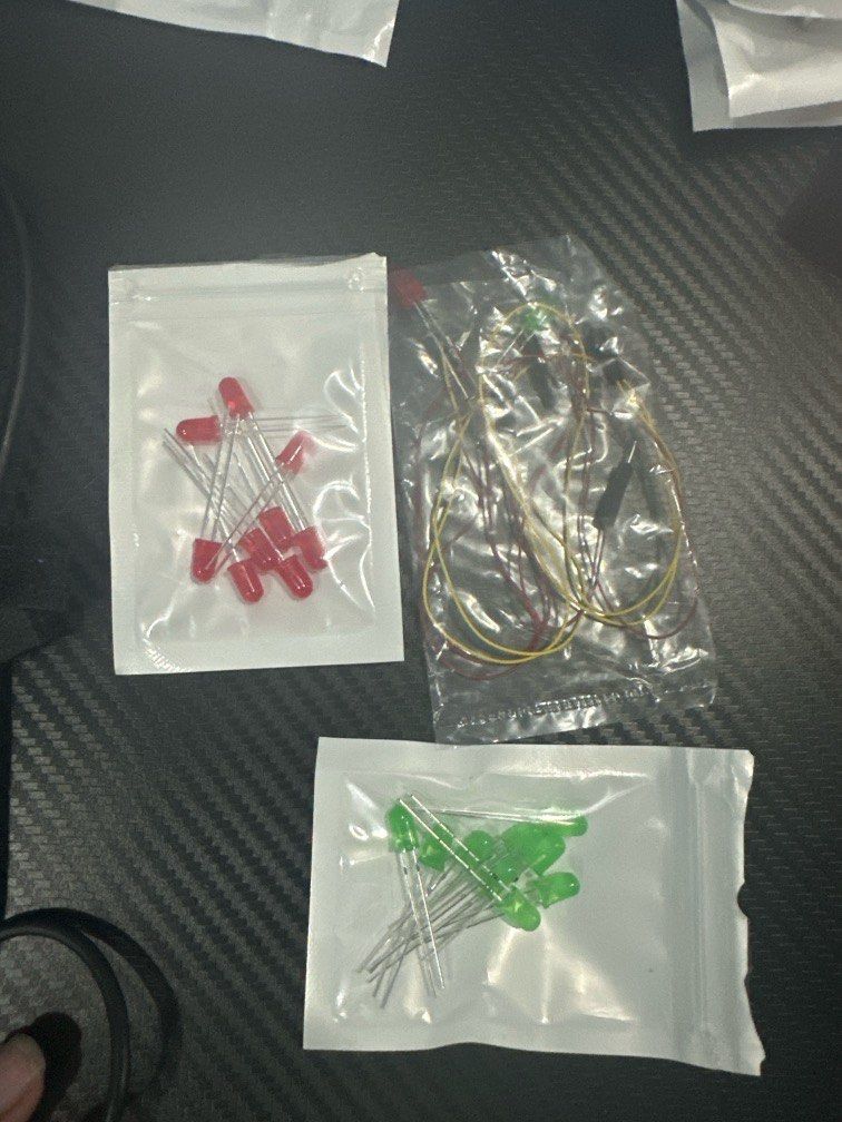 LED lights (Category: Other Accessories) located in Singapore. Submitted by jasontodd1134 (Listing ID 1365468708, Image 1). Description: Only used 1 green and 1 red LED as seen on the picture with the additional wire extension..