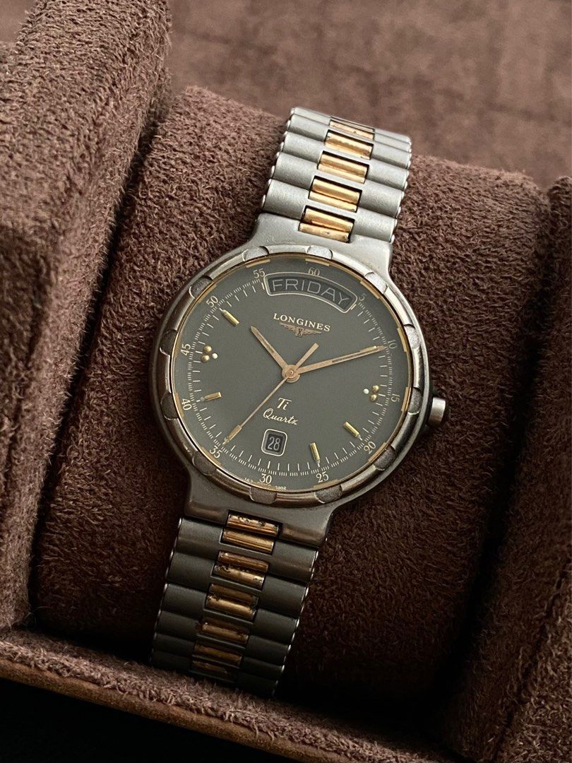 Longines Conquest Titanium (Category: Luxury Watches) located in Pasig City. Submitted by watchtradeph (Listing ID 1365379633, Image 2). Description: Longines Conquest Titanium [Ref: 21809263] Quartz Circa: 1980s Size: 34mm case Material: two-tone Titanium Bracelet fit: up to 16.3cm Dial: Day-Date President All original Newly serviced.