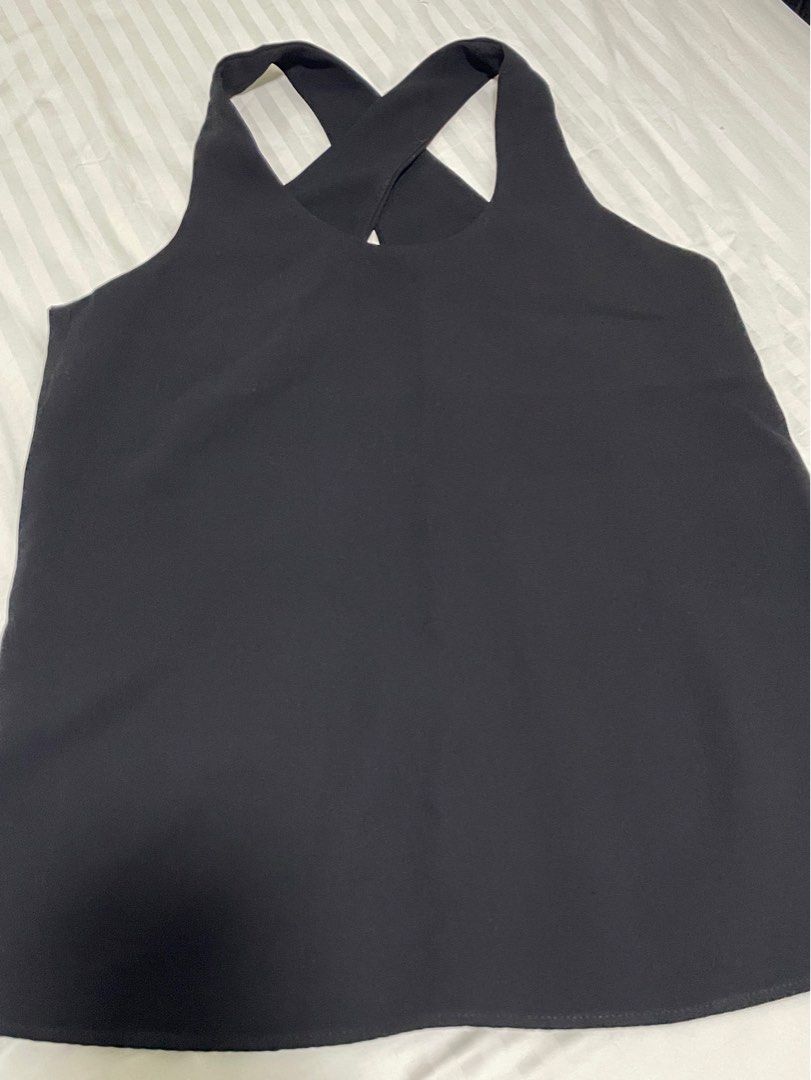 Mango black top (Category: Blouses) located in Pasig City. Submitted by declutter92 (Listing ID 1365460383, Image 1). Description: Wore it only once. Must be worn with strapless bra, which i dont like..