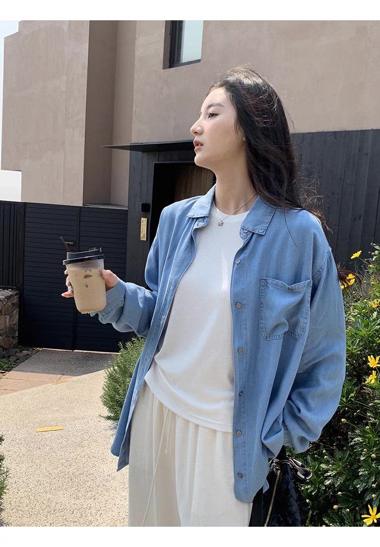 Nora Soft Tencel Denim Shirt (Category: Longsleeves) located in Singapore. Submitted by mommystote (Listing ID 1365456503, Image 3). Description: ✨Nora Soft Tencel Denim Shirt✨ Preorder • arrives in about two weeks Sizing ➕length➕shoulder ➕chest S:76,49,118 M:77,50,122 If you want to wear denim shirts even in summer, go for this one — made from a Tencel (lyocell) blend, it’s softer and more comfortable than regular denim jackets. It feels light o