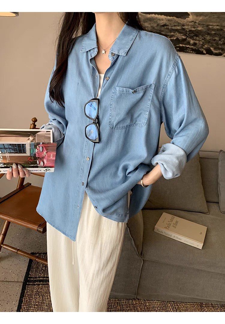Nora Soft Tencel Denim Shirt (Category: Longsleeves) located in Singapore. Submitted by mommystote (Listing ID 1365456503, Image 1). Description: ✨Nora Soft Tencel Denim Shirt✨ Preorder • arrives in about two weeks Sizing ➕length➕shoulder ➕chest S:76,49,118 M:77,50,122 If you want to wear denim shirts even in summer, go for this one — made from a Tencel (lyocell) blend, it’s softer and more comfortable than regular denim jackets. It feels light o
