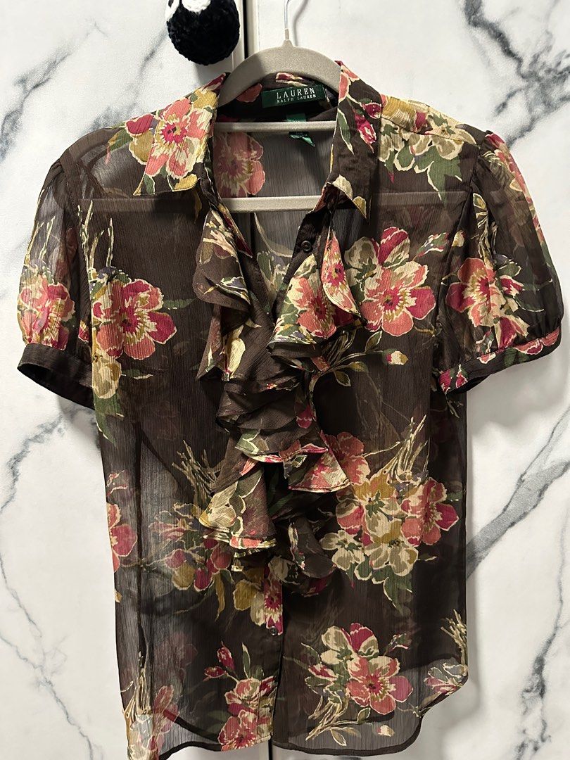Ralph Lauren RL Sheer Ruffle Top (Category: Blouses) located in Paranaque City. Submitted by kryptonnyte (Listing ID 1365435884, Image 1). Description: Size XS on tag but fits small as well Lowballers and demanding/unreasonable potential buyers will be ignored. Please don’t ask for the last price if you are not going to purchase the item. Let’s not waste each other’s time ☺️ .