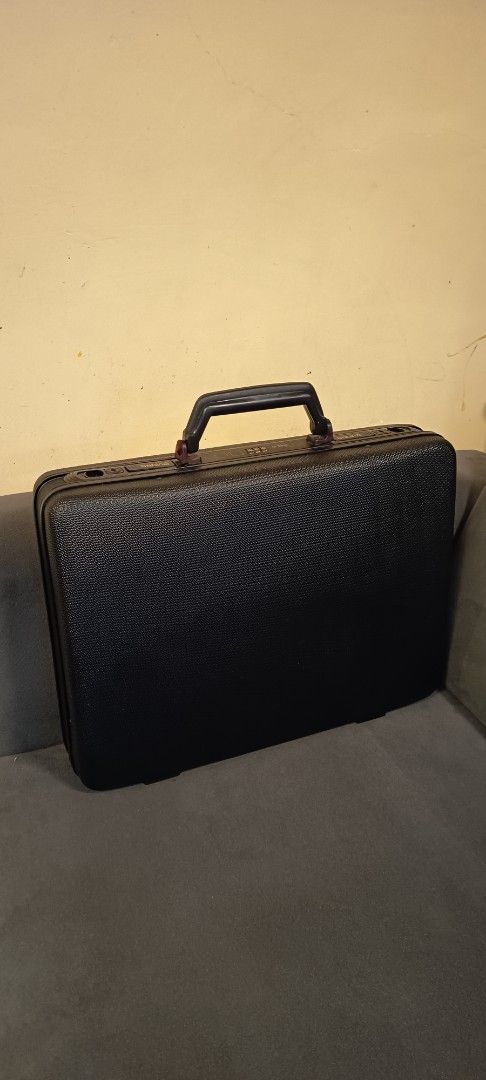 Vintage Sabina Hard Shell Attaché Briefcase Black Combination Lock (Category: Briefcases) located in Binangonan. Submitted by retrovintagesourceph (Listing ID 1365351626, Image 3). Description: Vintage Sabina black Hard Shell Attaché Briefcase. Combination lock works and is set at “000”. There is a key lock but unfortunately no key. 17.5" wide x 13"high (without handle) x 4.5".