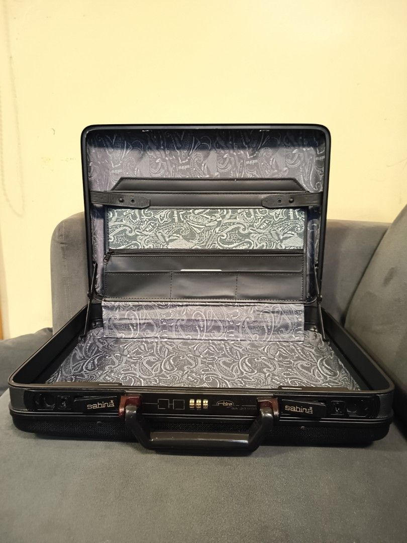 Vintage Sabina Hard Shell Attaché Briefcase Black Combination Lock (Category: Briefcases) located in Binangonan. Submitted by retrovintagesourceph (Listing ID 1365351626, Image 2). Description: Vintage Sabina black Hard Shell Attaché Briefcase. Combination lock works and is set at “000”. There is a key lock but unfortunately no key. 17.5" wide x 13"high (without handle) x 4.5".