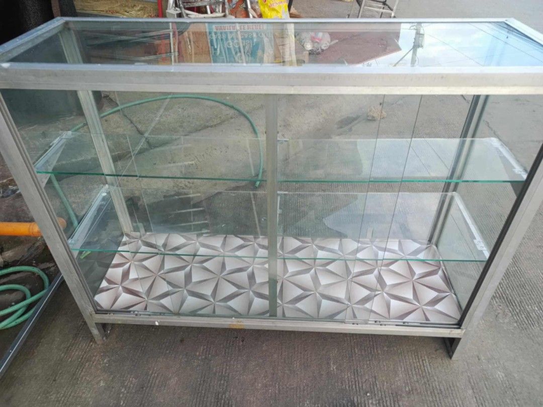 4feet Glass Stante 3 Layer (Category: Office Furniture & Fixtures) located in Rodriguez. Submitted by amara0914 (Listing ID 1365517971, Image 1). Description: For Sale 2nd Hand No Hidden Crack or Issue 4feet Glass Stante 3 Layer 38 inches height 16 inches width.